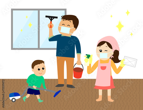 A happy family of three cleaning the house