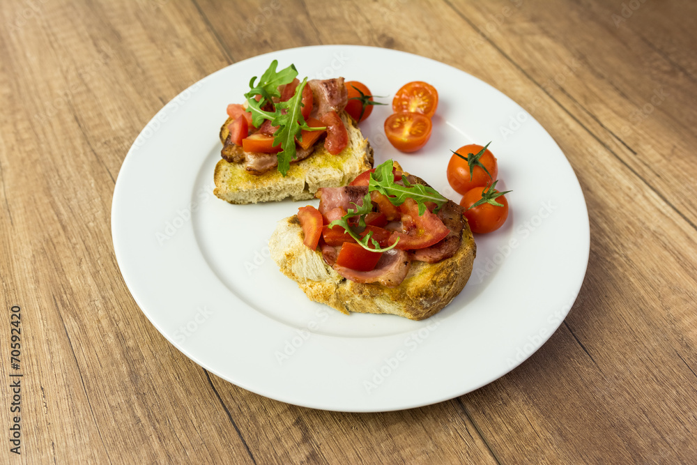 Plate With Italian Bruschetta On Table Plate With Italian Bruschetta On Table
