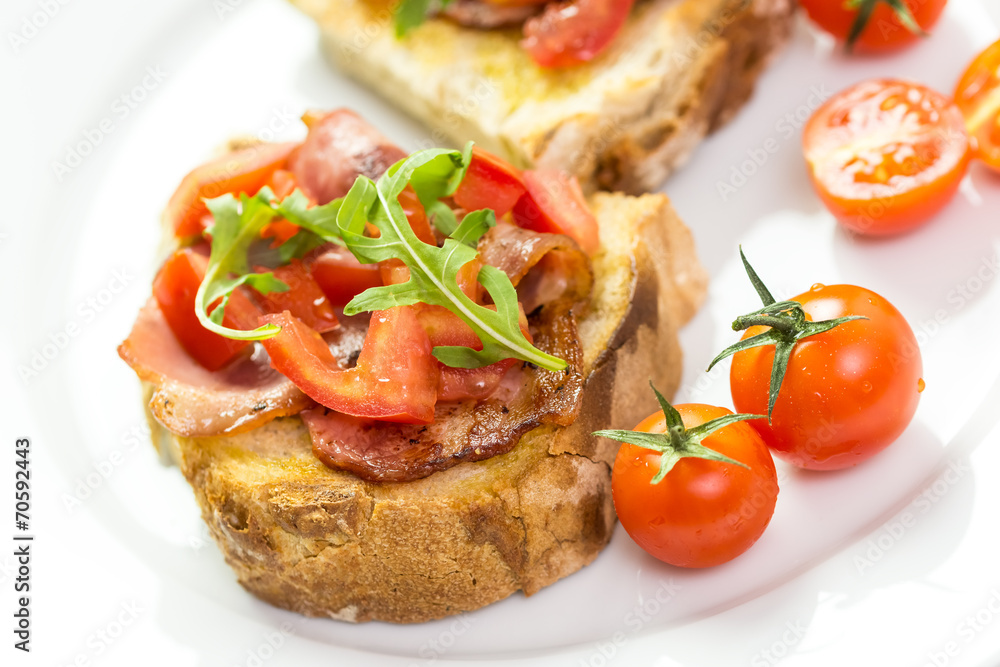 Bruschetta Grilled Bread, Prosciutto, Rucola And Cherry Tomatoes Bruschetta Grilled Bread, Prosciutto, Rucola And Cherry Tomatoes