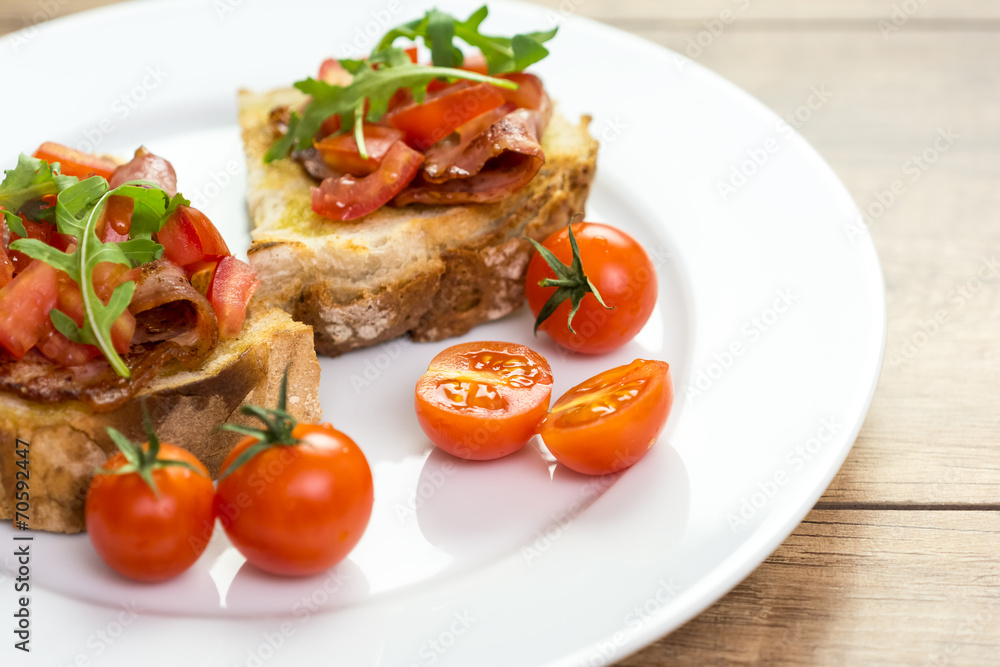 Bruschetta Grilled Bread, Prosciutto, Rucola And Cherry Tomatoes Bruschetta Grilled Bread, Prosciutto, Rucola And Cherry Tomatoes