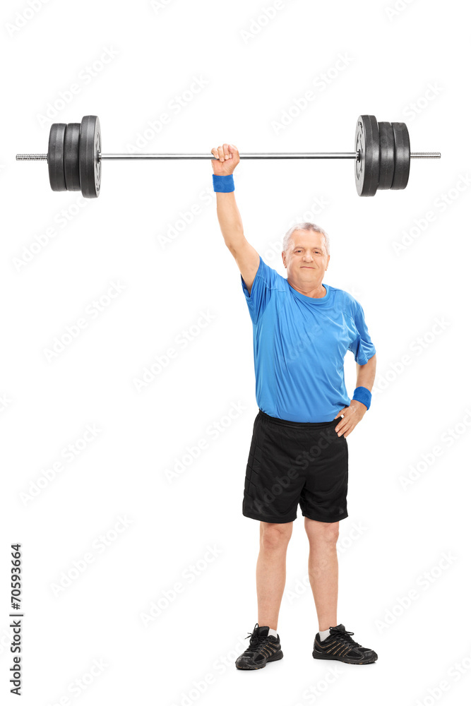 Strong senior holding a weight in one hand Strong senior holding a weight in one hand