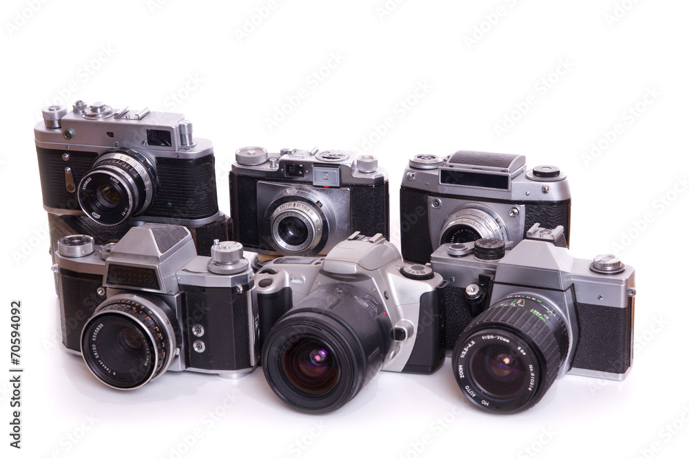 verschiedene Generationen an Fotoapparaten