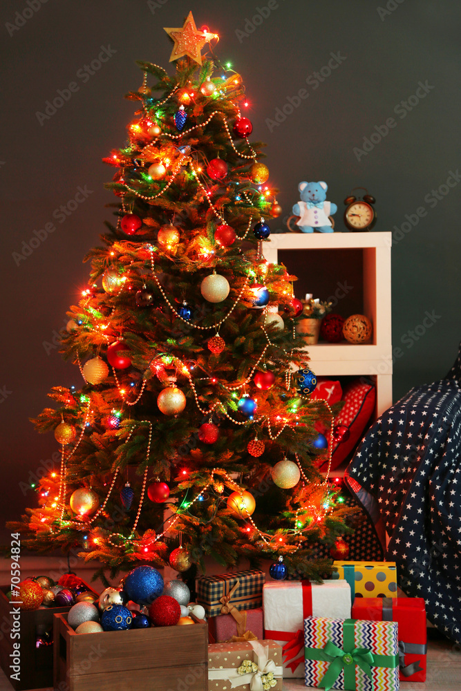 Fototapeta premium Decorated Christmas tree at home