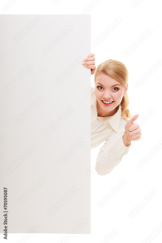Businesswoman hiding behind blank copy space banner