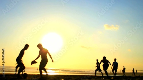 Summer Beach Football - Sand Soccer at Sunset