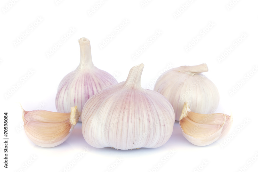 Garlic bulb and cloves on white background Garlic bulb and cloves on white background