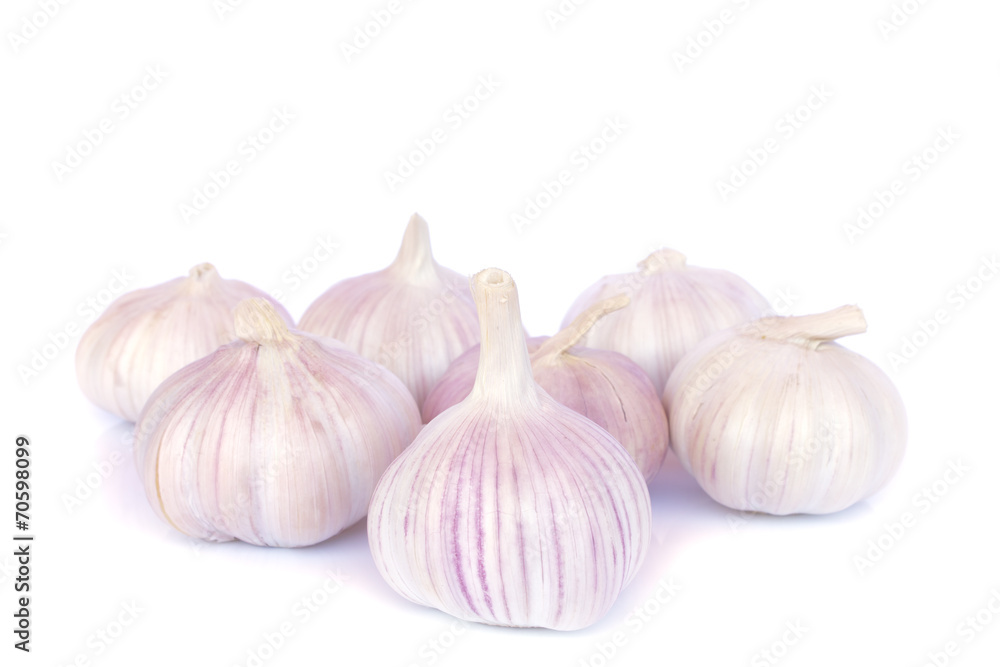 Garlic bulb and cloves on white background Garlic bulb and cloves on white background