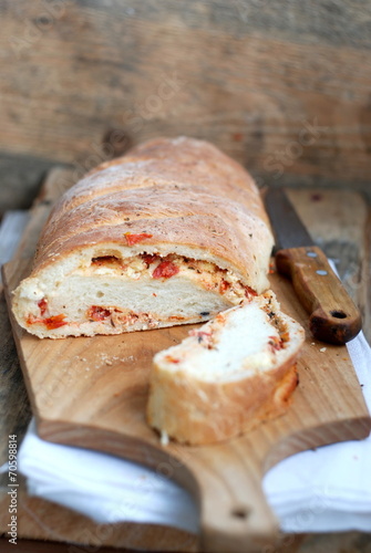 Homemade bread with goat cheese and sun-dried tomatoes
