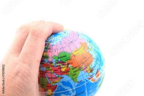 model of earth in the human hand