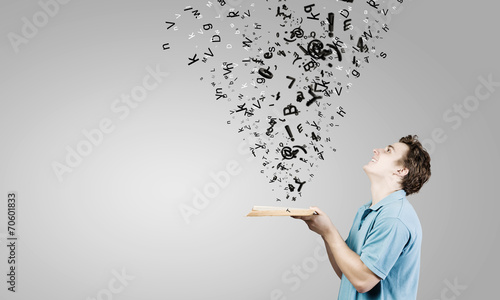 Canvas-taulu Guy with book
