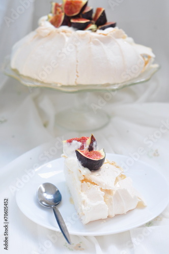 Pavlova with figs and honey, selective focus