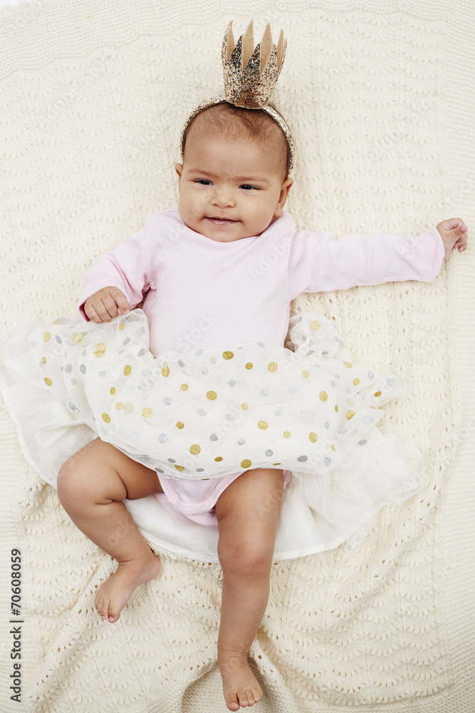 Six month old princess in studio, portrait. Six month old princess in studio, portrait.