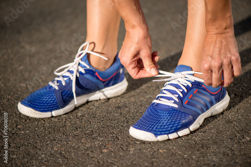 Runnning shoes on runner, close-up