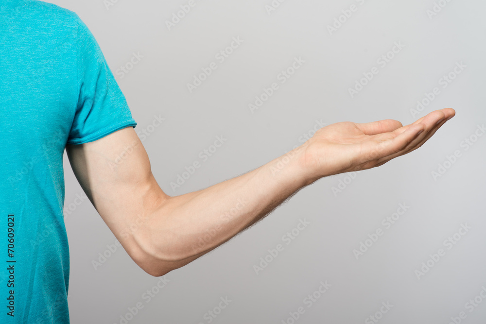 man points to something open hand man points to something open hand