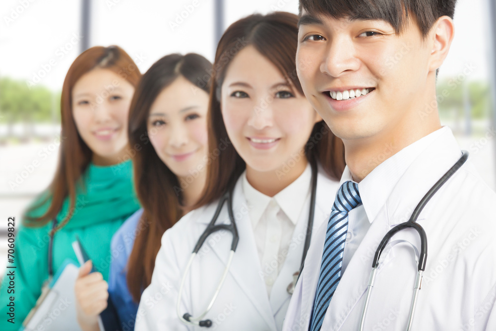 Professional medical doctor team standing in office Professional medical doctor team standing in office
