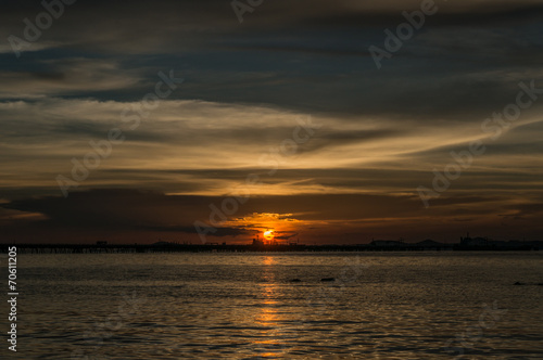 silhouette of Laem Chabang seaside at Sriracha with sunset sky