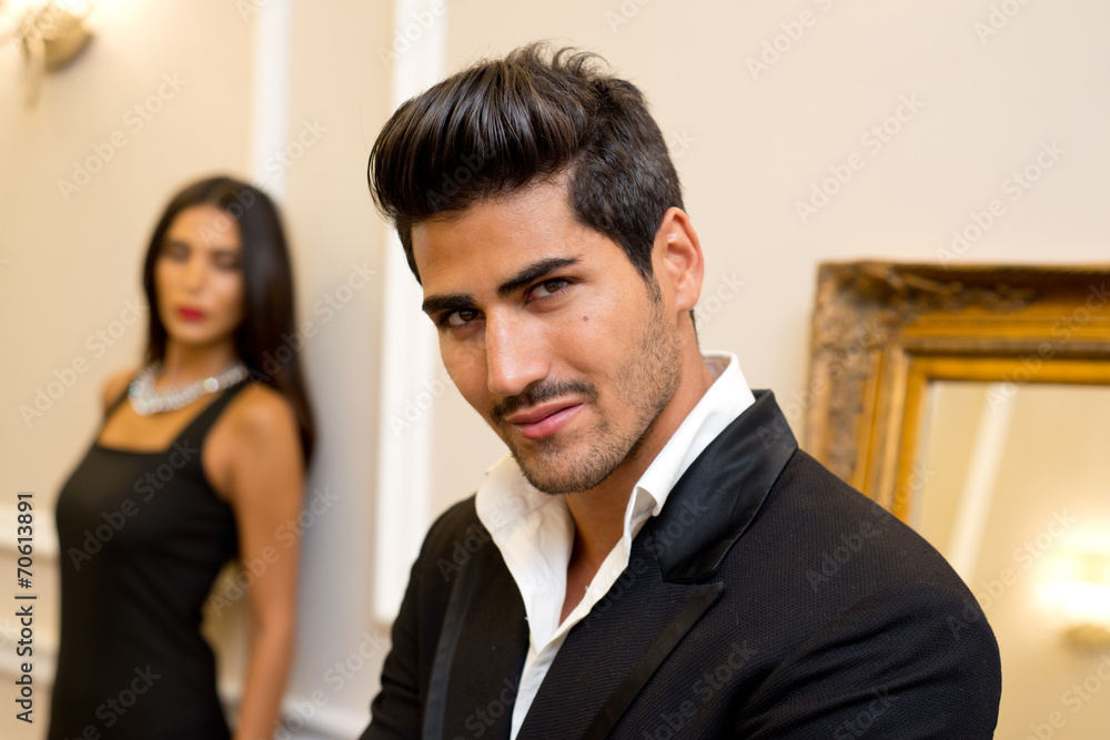 Fashionable male and female model in an elegant setting Fashionable male and female model in an elegant setting