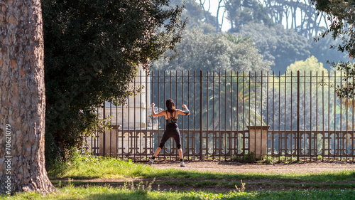 Photos Young Roman Woman doing Stretching