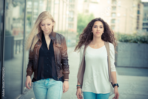 blonde and brunette beautiful stylish young women © Eugenio Marongiu