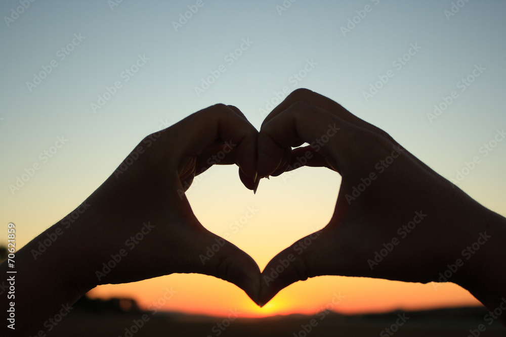 Fototapeta premium hands forming a heart