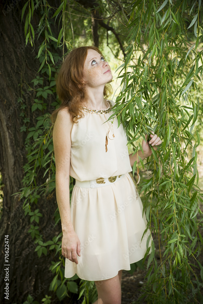 Portrait of redhead girl on nature Portrait of redhead girl on nature