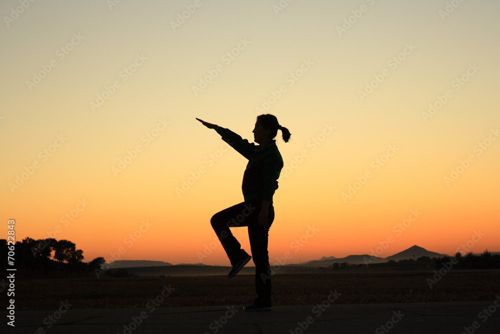 Fototapeta premium Woman at Sunset