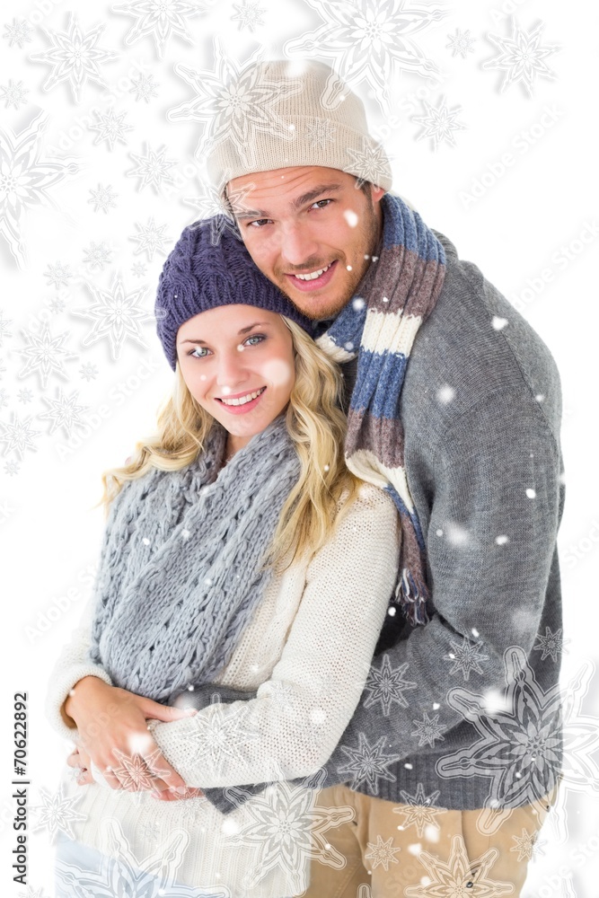 Obraz premium Attractive couple in winter fashion hugging