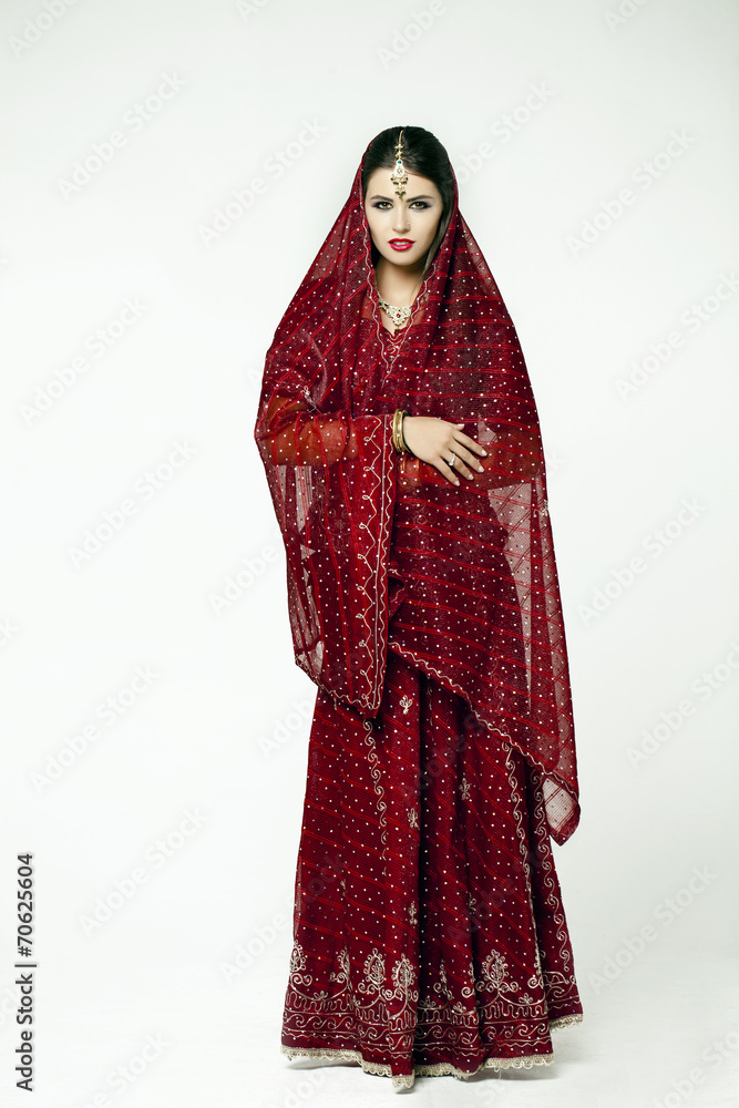 Young pretty woman in indian red dress Young pretty woman in indian red dress