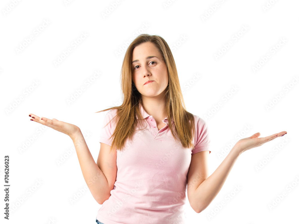 Girl having doubts over isolated white background Girl having doubts over isolated white background