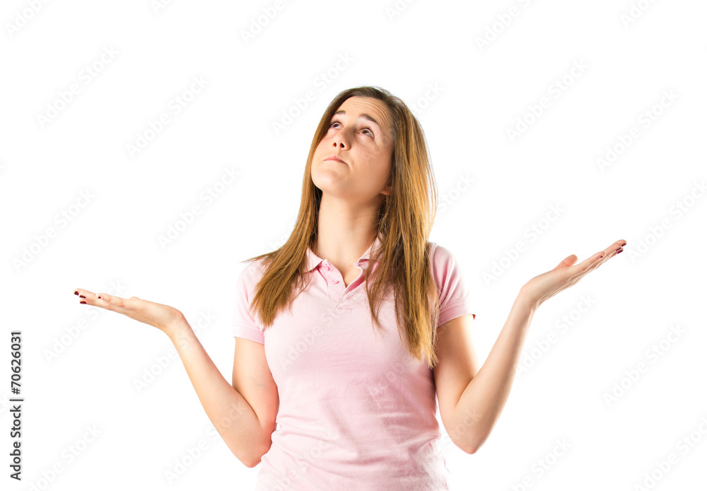 Girl having doubts over isolated white background Girl having doubts over isolated white background