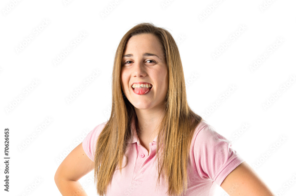 Girl doing a joke over isolated white background Girl doing a joke over isolated white background