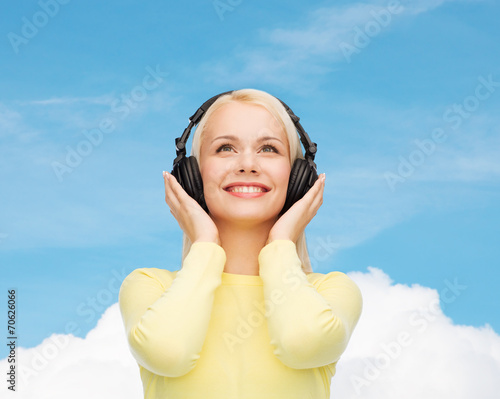 smiling young woman with headphones