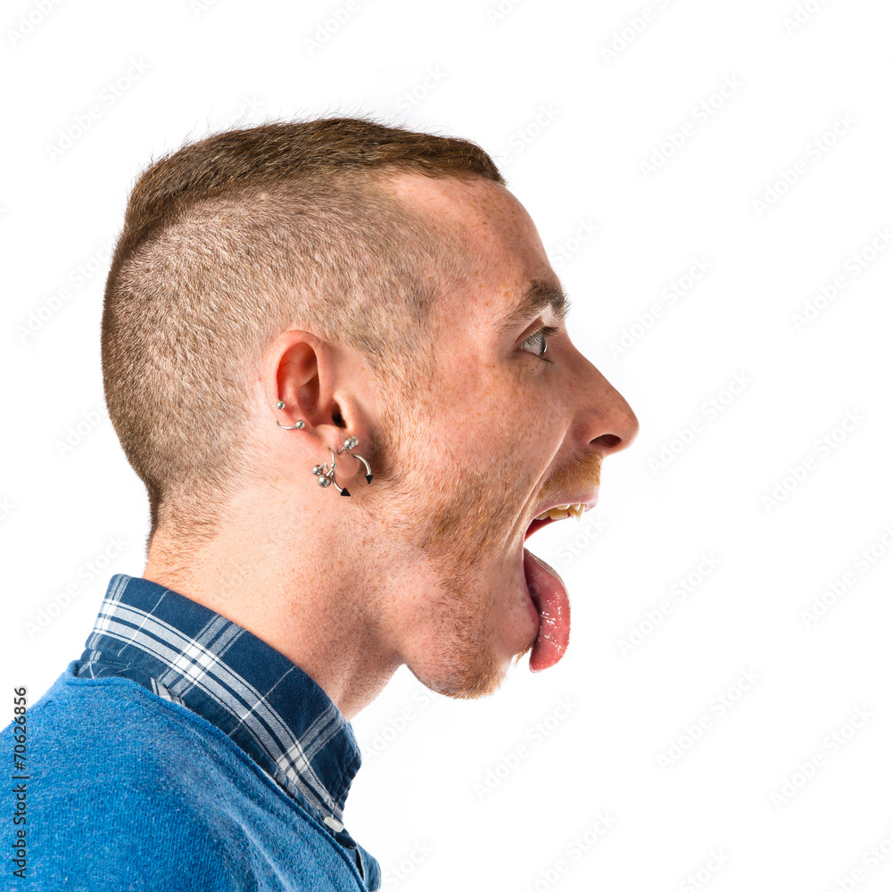 Man doing a joke over isolated white background Man doing a joke over isolated white background