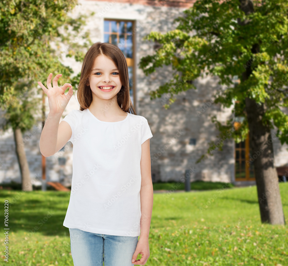 smiling little girl in white blank t-shirt smiling little girl in white blank t-shirt