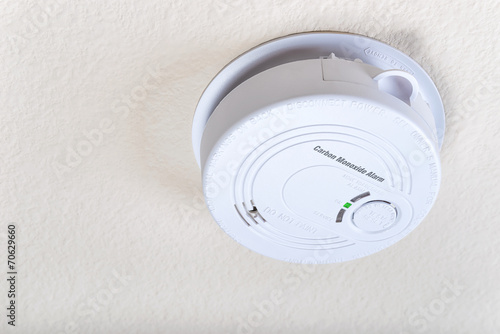Carbon monoxide alarm mounted on the ceiling photo