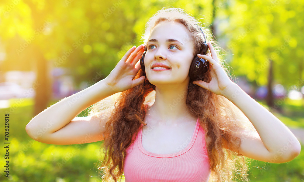 Summer fun lifestyle portrait young girl with headphones Summer fun lifestyle portrait young girl with headphones