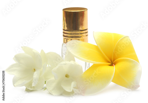 Jasmine flower and frangipani with perfume bottle