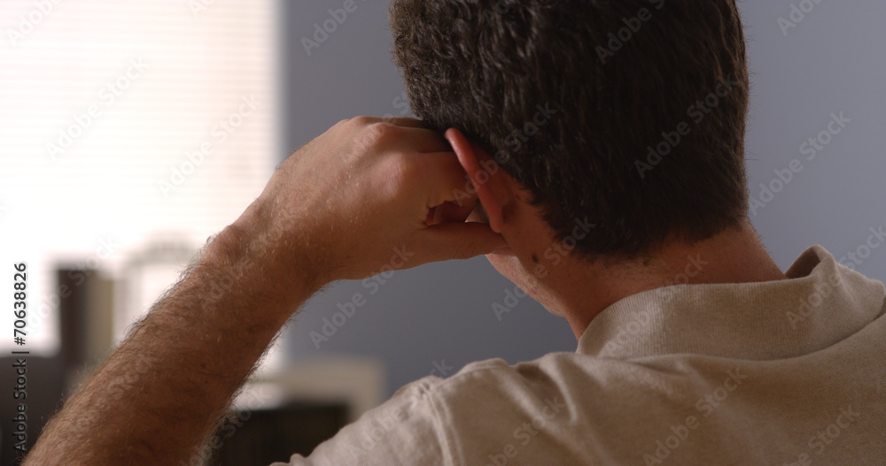 Man looking away and thinking Man looking away and thinking