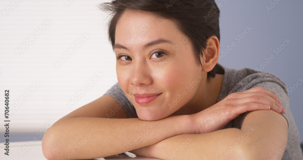 Attractive Chinese woman looking at camera Attractive Chinese woman looking at camera