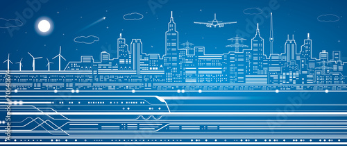 Train on the background of the light city, airplane fly
