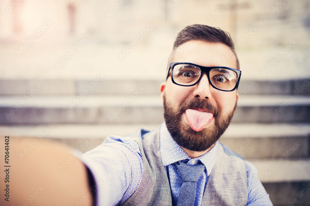 Hipster businessman taking selfie Hipster businessman taking selfie