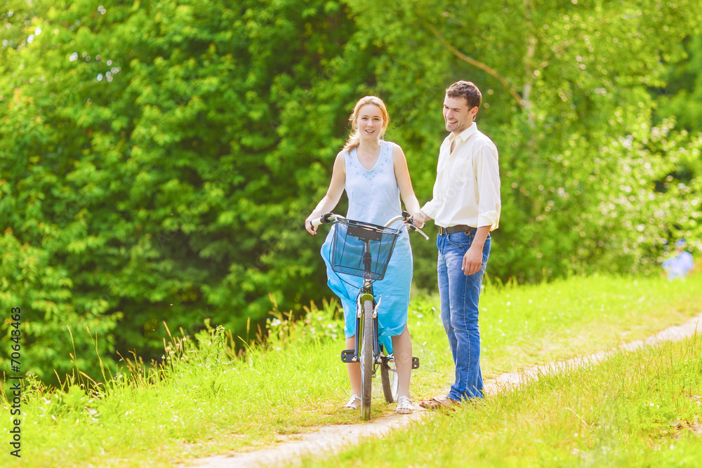Fototapeta premium Two young Romantic Lovers Spending Their Time in Summer Forest O