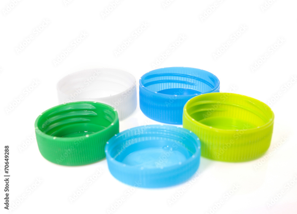 Plastic bottle caps isolated against a white background Plastic bottle caps isolated against a white background