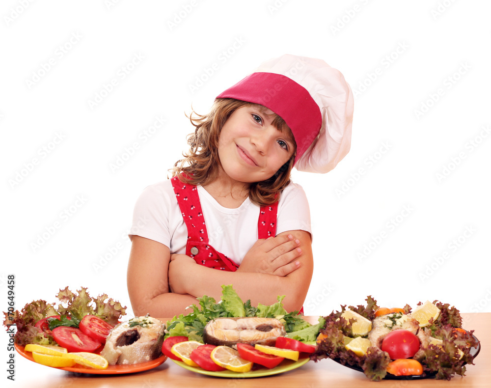 happy little girl cook with salmon sea food happy little girl cook with salmon sea food