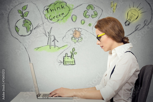 woman working computer solving ecology renewable energy problem