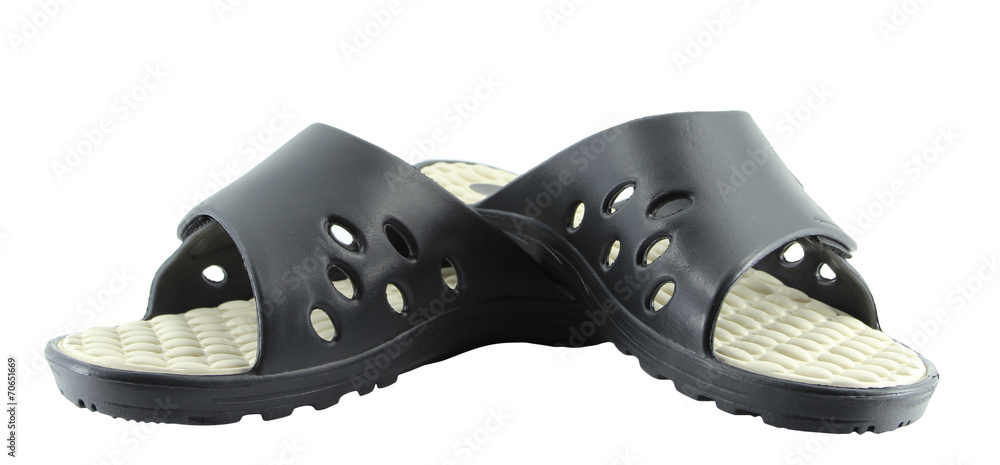 Obraz premium Rubber flip flops on a white background