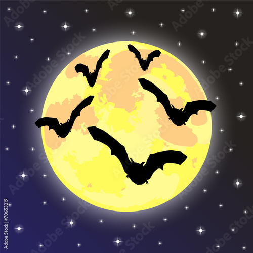 bats on the background of the full moon