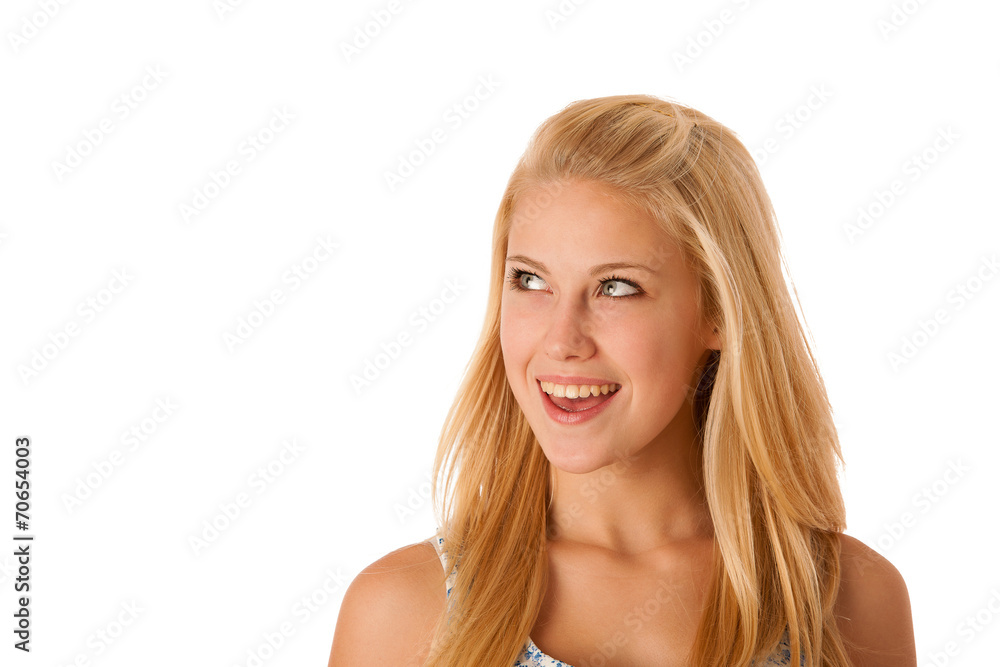 Beautiful young woman looks in copy space Beautiful young woman looks in copy space