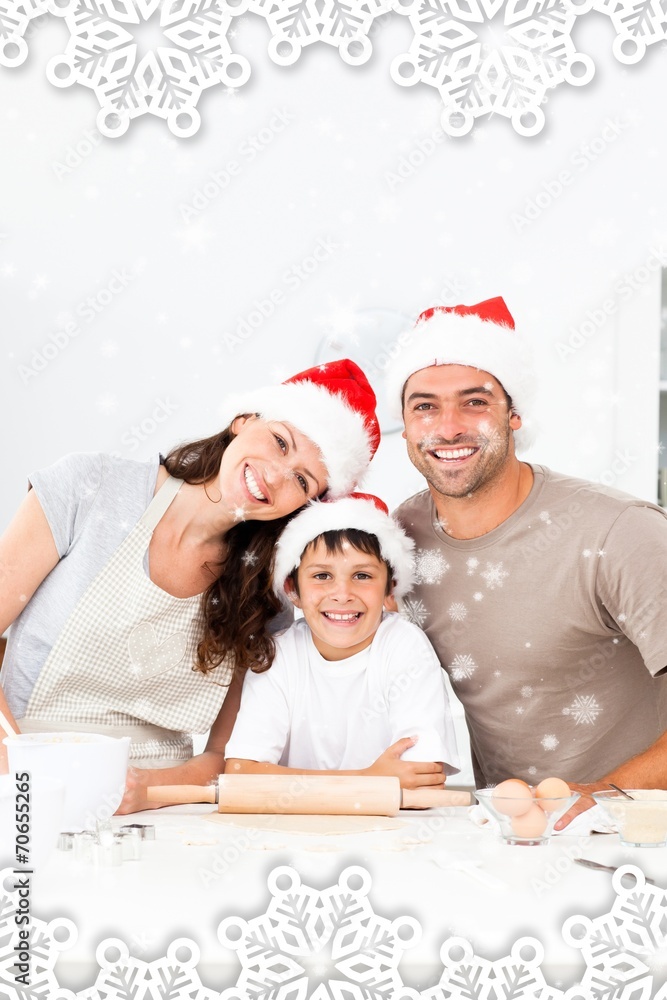Happy family baking christmas cookies together Happy family baking christmas cookies together