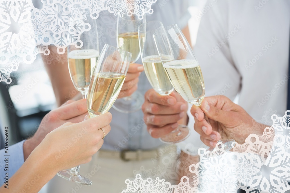 Composite image of hands toasting with champagne Composite image of hands toasting with champagne